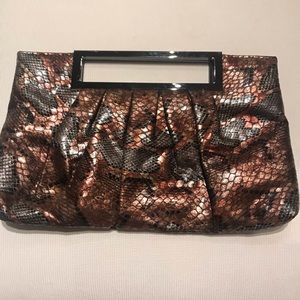 Copper faux leather snakeskin clutch